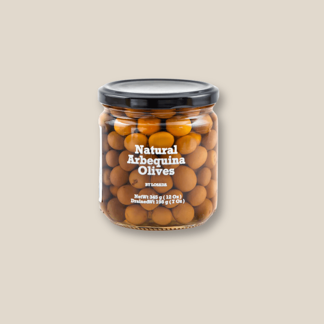 Dequmana Natural Arbequina Olives w/ Pits, 12 oz Jar - The Spanish Table