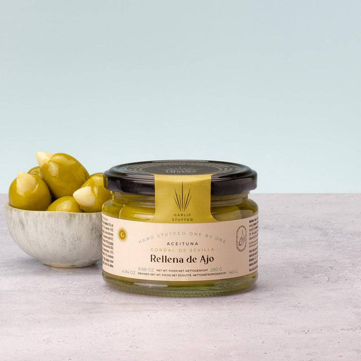 Triana Olivas. Gordal Olives from Seville Stuffed w/ Garlic - The Spanish Table