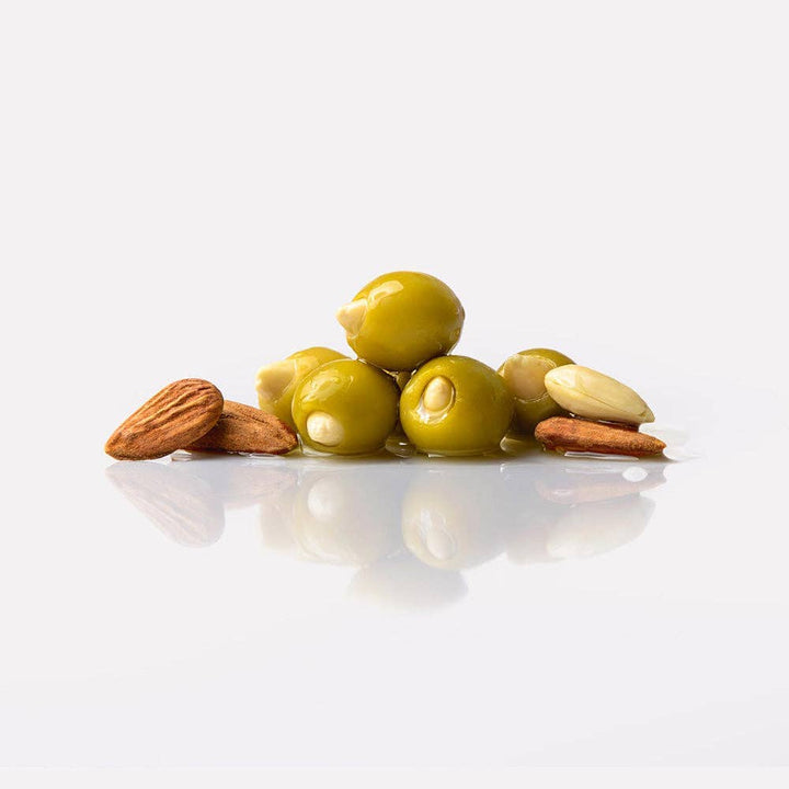 Triana Olivas. Manzanilla Olives Stuffed with Almonds - The Spanish Table